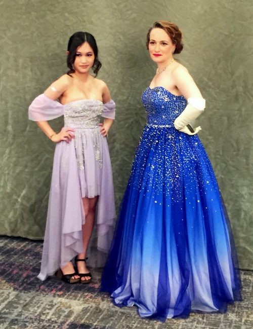 Rebecca Kuang  in a lilac gown and Mary Robinette Kowal in a blue ombre gown