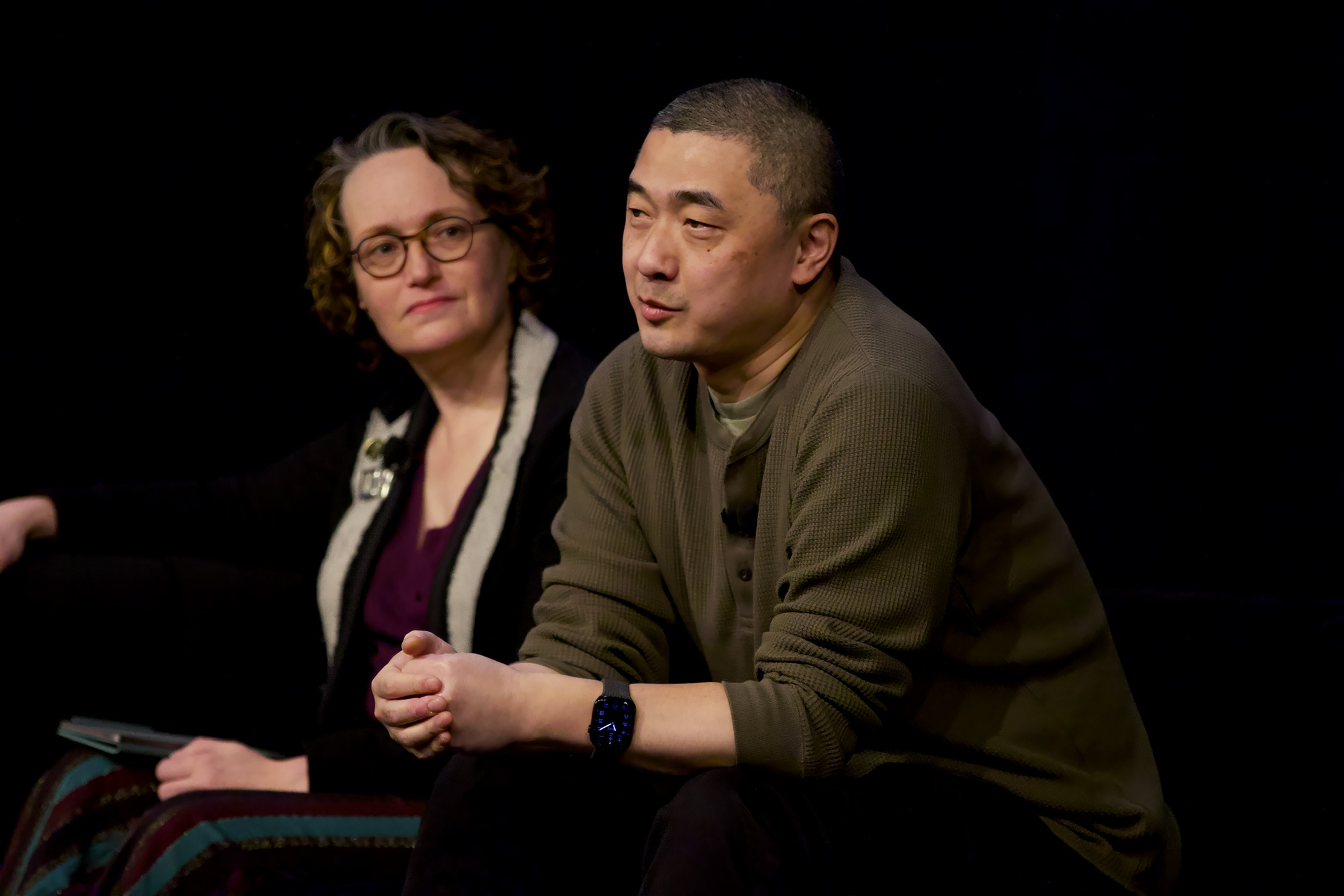 Mary Robinette Kowal and Ken Liu on stage speaking.